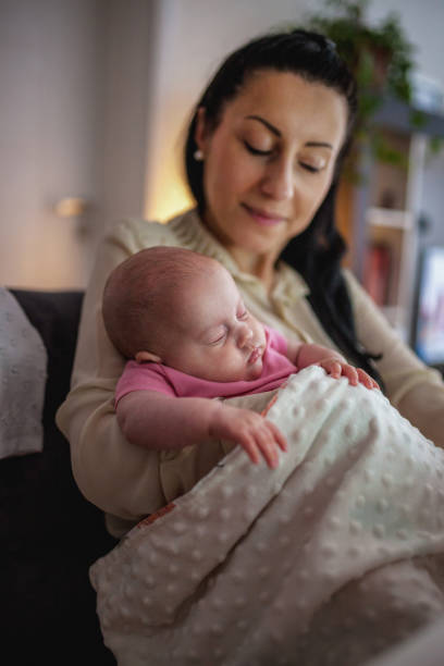 istock Young mother working and spending time with baby 1154987445