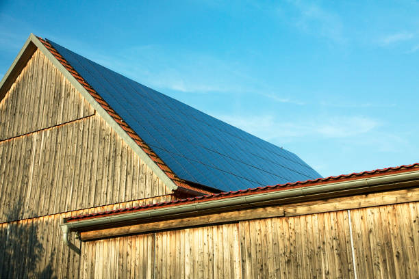 Roof with photovoltaic cells stock photo
