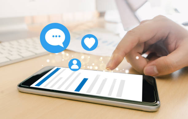 istock hand touching touch pad, social media concept 1154990457