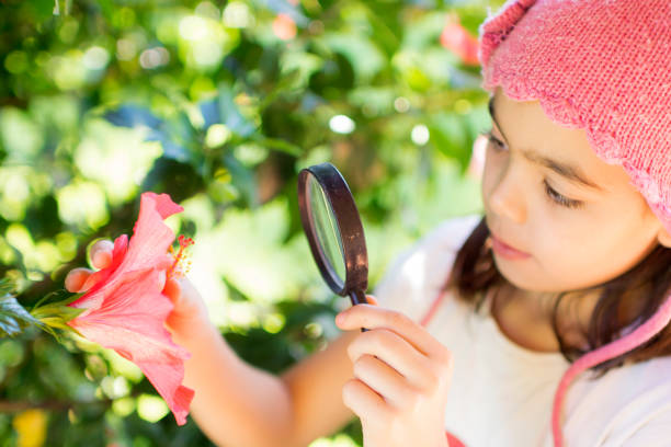 istock Girl With Flower 1154990545
