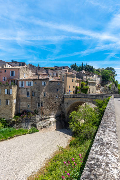 istock Across the river towards medieval Vaison la Romaine 1154992502