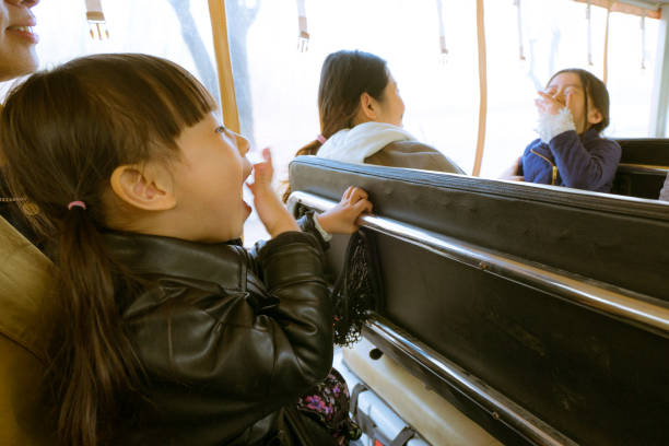 istock two young girl laughing at each other 1154994706