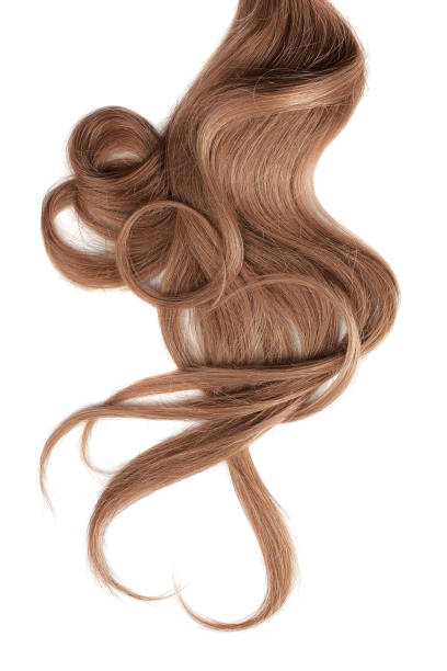 istock Brown hair isolated on white background. Heart shape 1154995659