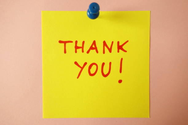istock Sticky note with text Thank you on pink background 1154997357