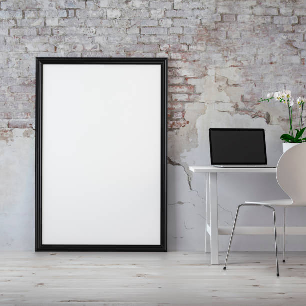 istock Workdesk with decoration, picture frame and copy space -ruined wall 1155000257