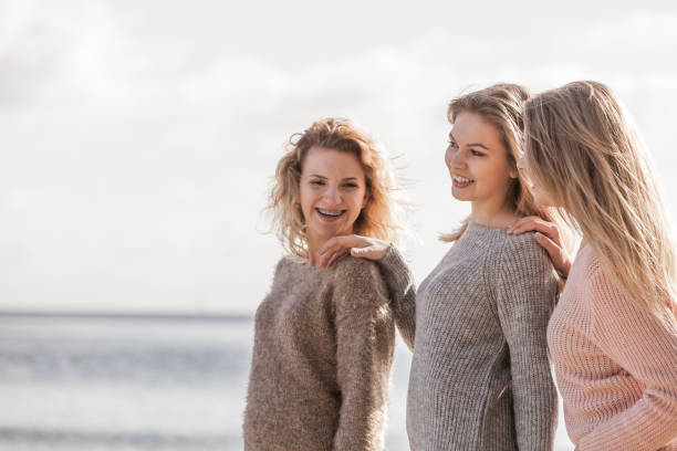 istock Three fashionable models outdoor 1155004806