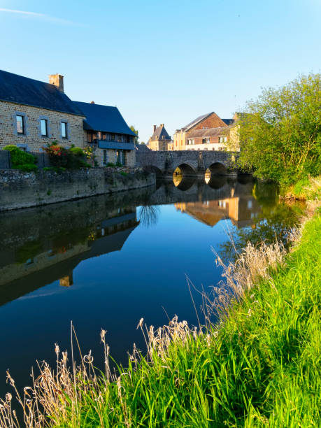 istock Late evening sunshine on the River Selune at Ducey-les-Cheris 1155005280