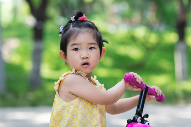 Little girl playing outdoors