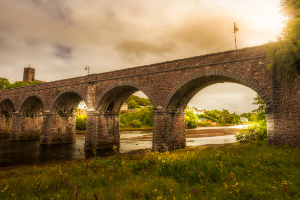 sunrise over a stone bridge in Ireland