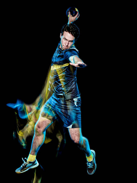 istock handball player young man isolated speed light painting 1155010234