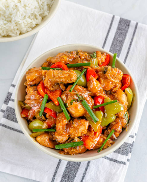 istock Sweet and Sour Chicken in a Bowl with Rice 1155016102
