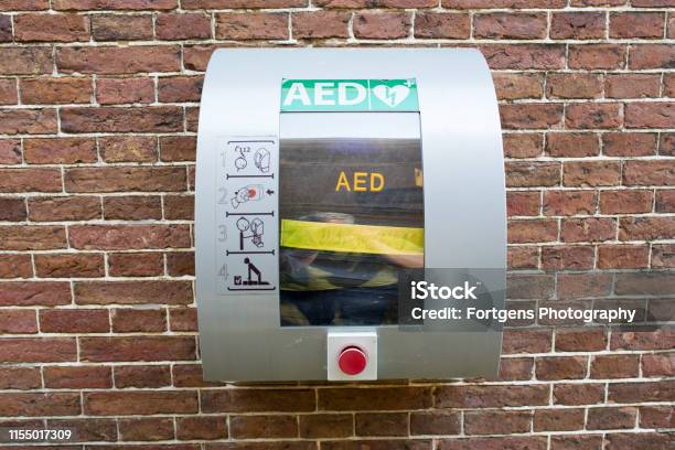 Aed Heart Defibrillator In A Public Location For Lifesaving Cardiopulmonary Resuscitation Stock Photo - Download Image Now