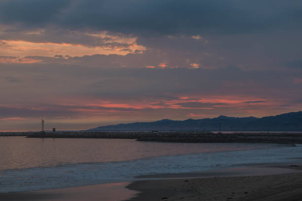 istock Summer storm clouds amid sunset in Los Angeles, CA 1155018031