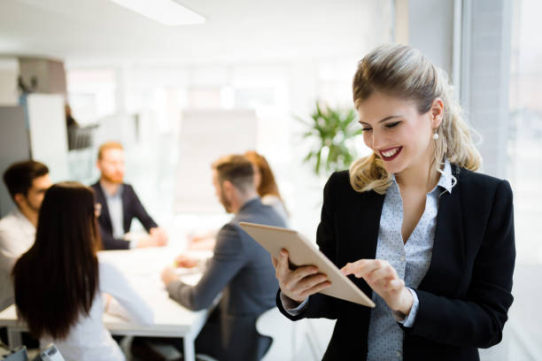 istock Business people working together on project and brainstorming in office 1155018855