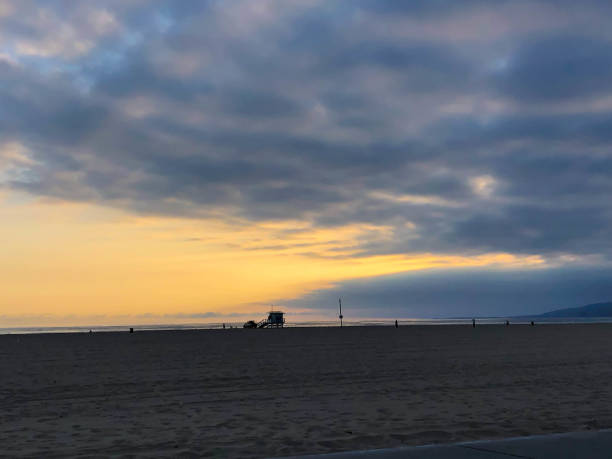 istock Hazy moody sunset over pacific ocean and Venice beach 1155020391