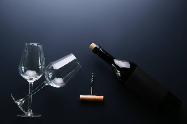 istock Showcase of vintage wine bottles with empty sticker labels. 1155023030