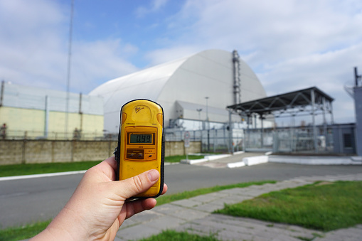 The new shelter over the remains of reactor 4 and the old sarcophagus at Chernobyl nuclear power plant.