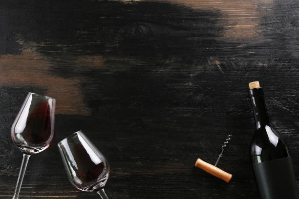 istock Showcase of vintage wine bottles with empty sticker labels. 1155023577