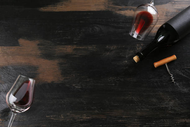 istock Showcase of vintage wine bottles with empty sticker labels. 1155023694