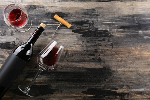istock Showcase of vintage wine bottles with empty sticker labels. 1155024277