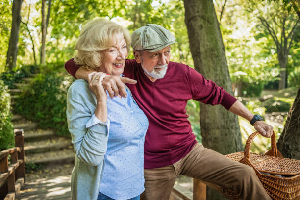 istock cheerful senior couple going for picnic 1155024539