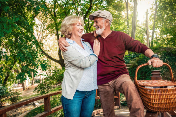 istock cheerful senior couple going for picnic 1155024608