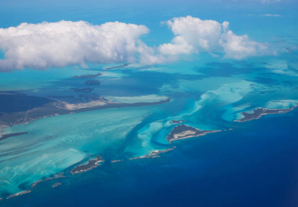 Aerial view from the plane, flying over Bahamas Aerial shots from the plane while flying over Exuma Cay, Bahamas exuma stock pictures, royalty-free photos & images