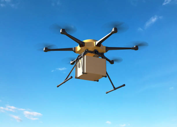 istock Delivery drone with the cardboard box 1155027994
