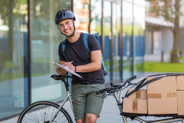 istock Bike courier making a delivery 1155031360