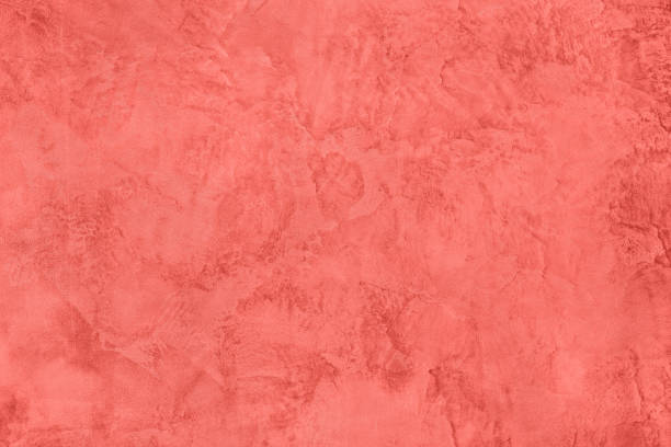 istock coral colored Concrete textured background with roughness and irregularities 1155035437