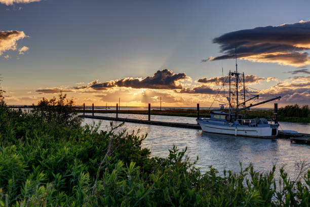 istock sunset at sea inlet bay 1155041320