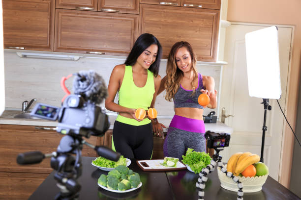 istock Two vloggers filming video for healthy live style 1155041660