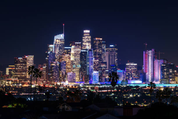 Downtown Los Angeles skyline at night Downtown Los Angeles skyline at night los angeles county stock pictures, royalty-free photos & images