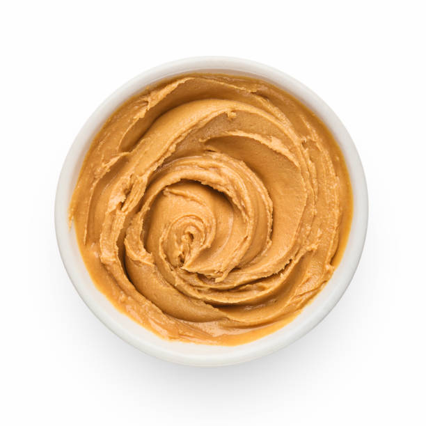 mantequilla de maní en blanco - peanut butter fotografías e imágenes de stock