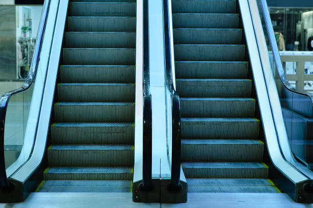 istock Moving stairs in the store. Escalator. 1155047853