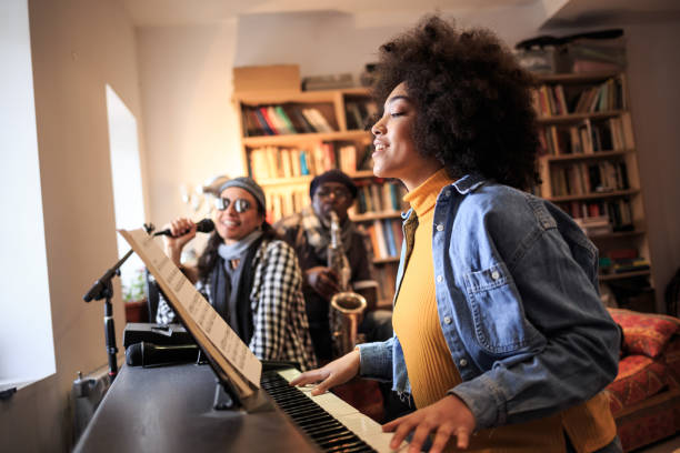 istock Band playing and singing at home 1155047917