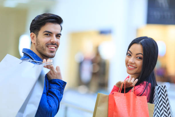 istock Couple in the shopping center 1155048096