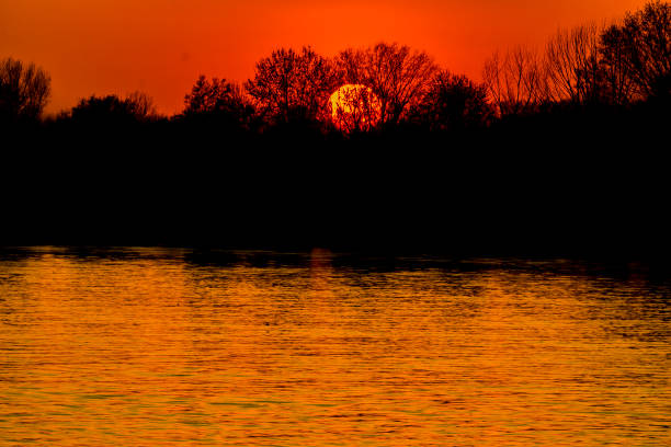 View at red sunset over calm river