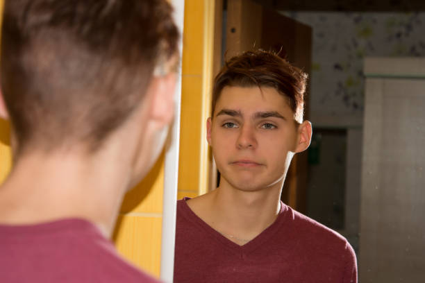 istock Bathroom. Guy and skin care. 1155049220