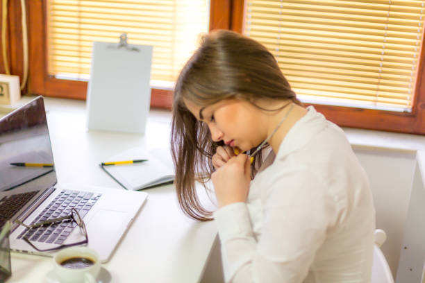 istock Young woman at office 1155050510