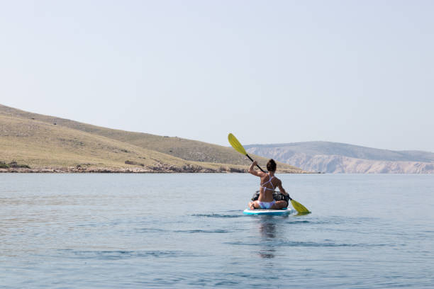 istock Woman paddling 1155051783