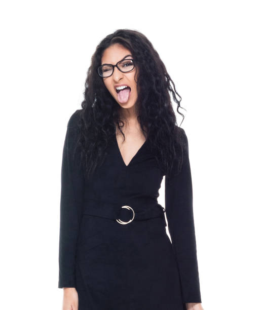 istock Attractive latino busineswoman is making a silly face 1155054197