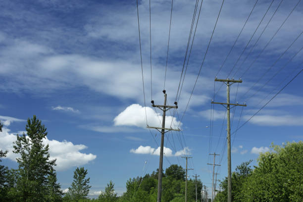 istock Clouds over Utility Poles in British Columbia, Canada 1155057394