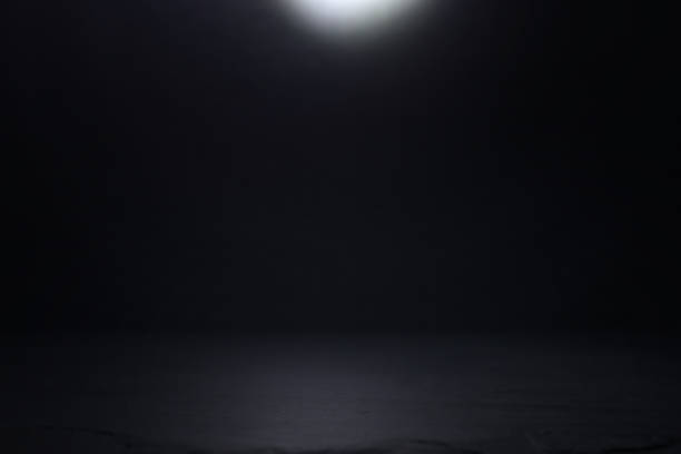istock abstract dark concentrate floor scene with spotlight and display 1155058262