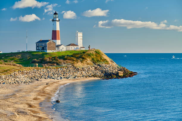 Montauk Lighthouse and beach Montauk Lighthouse and beach, Long Island, New York, USA. the hamptons photos stock pictures, royalty-free photos & images