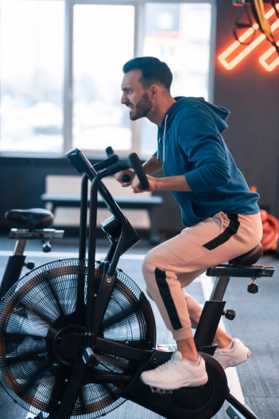 istock Athletic man feeling exhausted cycling for too long 1155059181