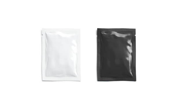 istock Blank black white sachet packet mockup, isolated, top view, 1155063174