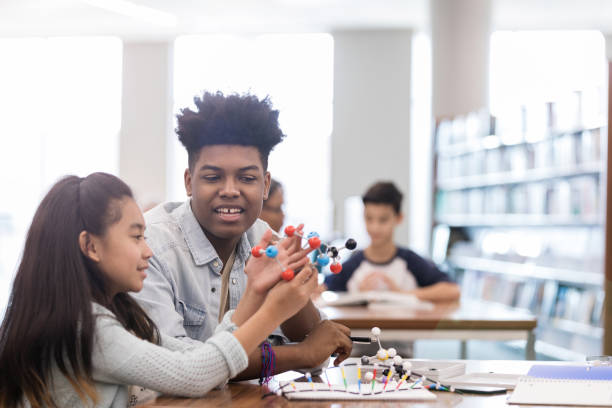 istock College tutor makes Chemistry fun for young student 1155064243