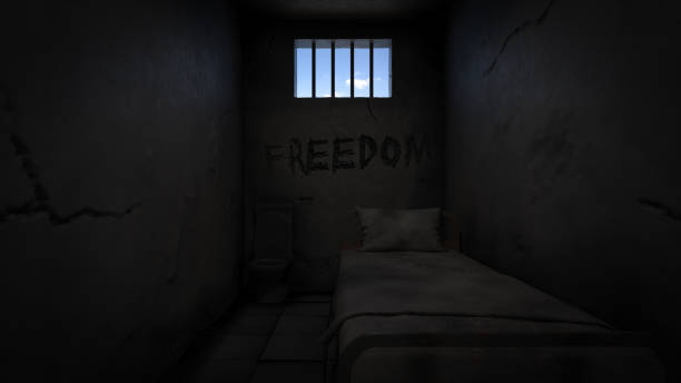 istock Rendering of a Prison Cell with Freedom Engraving on the Wall 1155064807