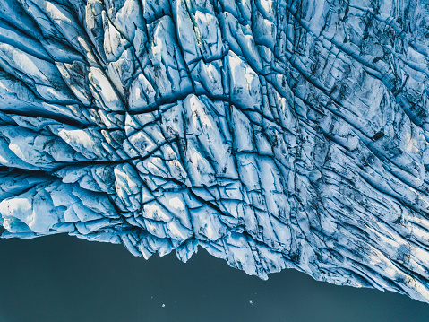 aerial view of glacier from above, ice texture landscape, beautiful nature blue background from Iceland